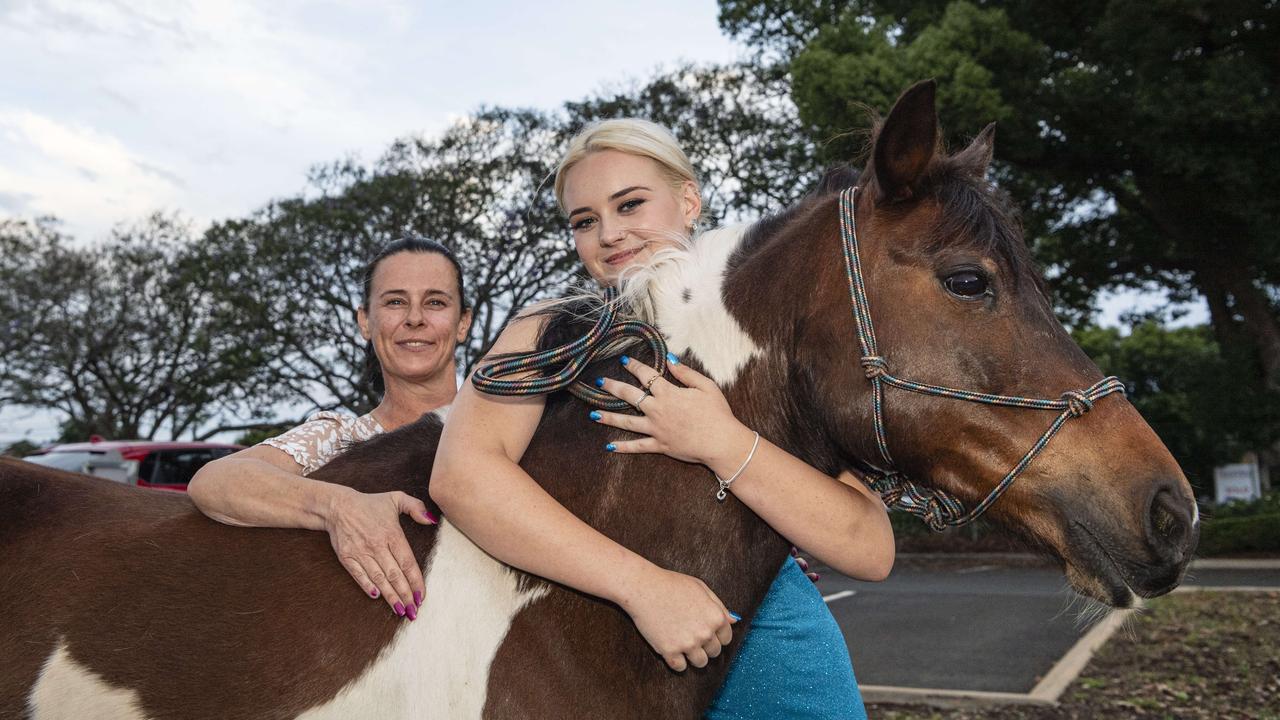 Graduate Caoilainn Finn with her mum Courtney Finn and Murphy at The Industry School formal at Clifford Park Racecourse, Tuesday, November 12, 2024. Picture: Kevin Farmer