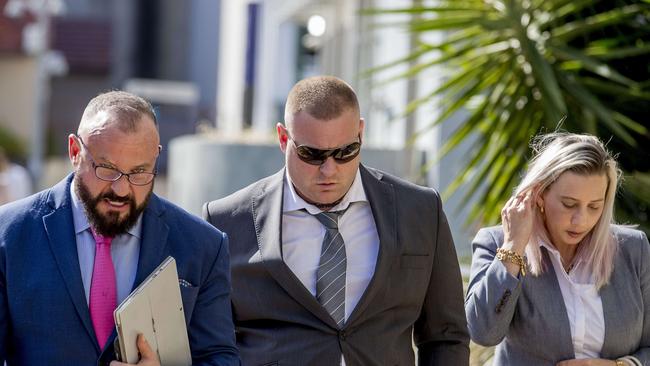 Carly Smith (right) at Southport Courthouse with her husband Steve Smith (centre) and lawyer Campbell MacCallum from Moloney MacCallum Abdelshahied Lawyers. Picture: Jerad Williams