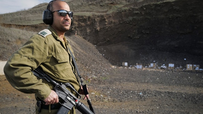 Captain Yinon Bitton carries out target practice at the Syrian border. Picture: Michael Giladi/The Times