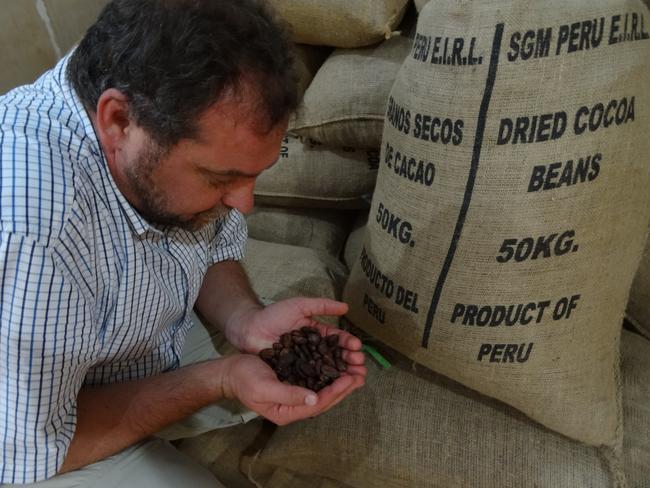 Igor Van Gerwen with some dried cocoa beans on his 2014 trip to Peru.