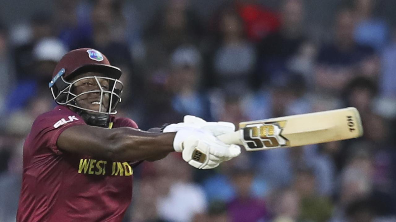 West Indies' Carlos Brathwaite bats during the Cricket World Cup match between New Zealand and West Indies at Old Trafford in Manchester, England, Saturday, June 22, 2019. (AP Photo/Jon Super)