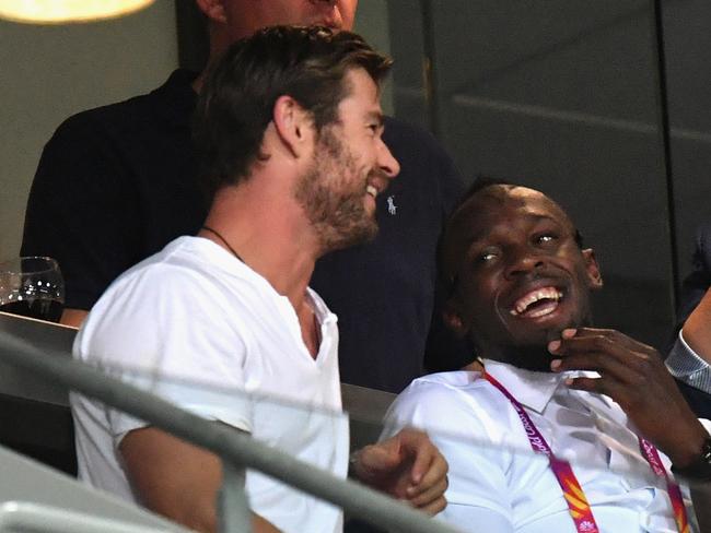 Chris Hemsworth and Usain Bolt watched the athletics together at Carrara Stadium Picture: Dan Mullan/Getty Images