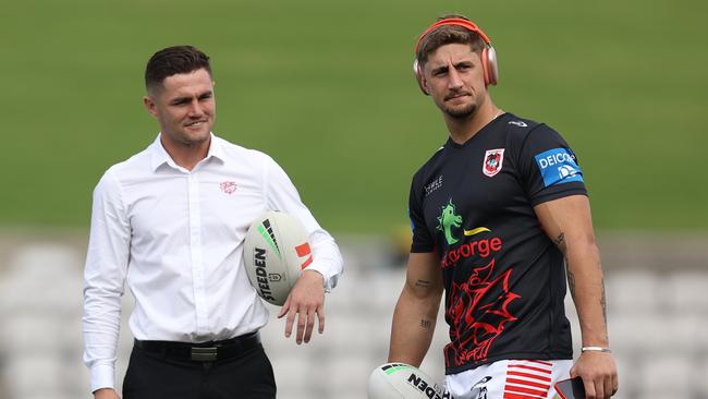Kyle Flanagan and want-away Dragons teammate Zac Lomax. Picture: Jason McCawley/Getty Images