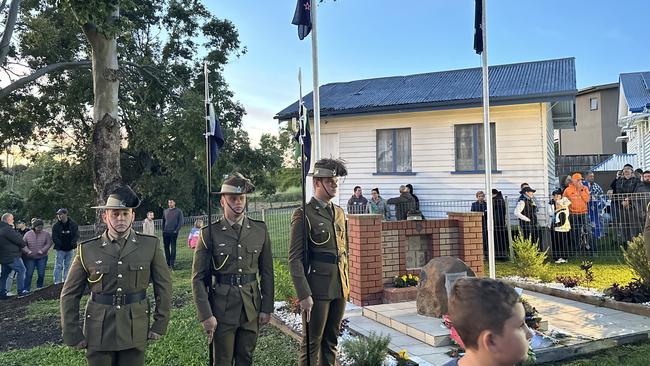 Geoff Benson announces last Anzac Day Dawn Service at Queensland Country Women’s Association hall memorial in Upper Coomera. Photo: Blair Wilkes