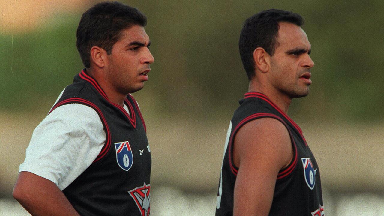Michael Long (right) is the reason Dean Rioli fell in love with Essendon even before he played for the Bombers.