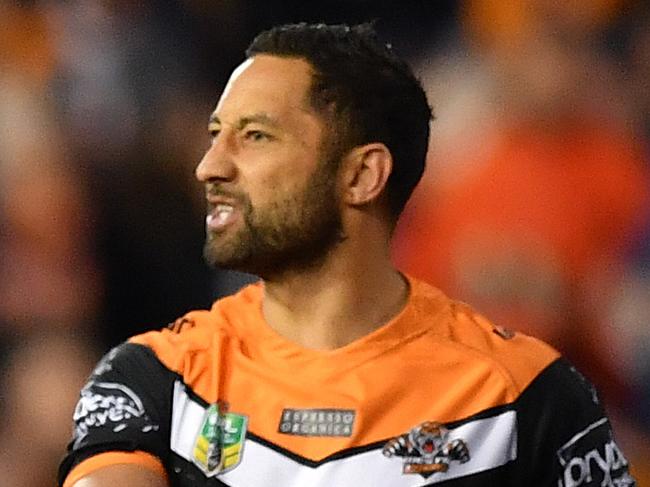 Robbie Farah (left) and Benji Marshall of the Tigers during the Round 23 NRL match between Wests Tigers and the St George-Illawarra Dragons at Leichhardt Oval in Sydney, Saturday, August 18, 2018. (AAP Image/Joel Carrett) NO ARCHIVING, EDITORIAL USE ONLY