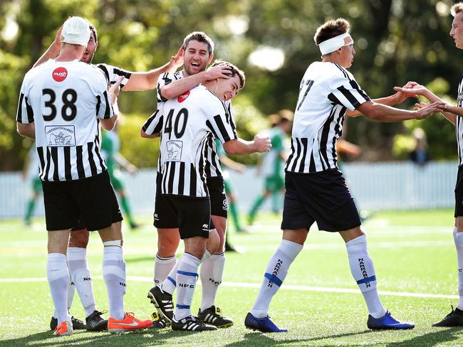 Narrabeen's Tom Boland (40) is congratulated after scoring v Manly Vale during their MWFA Premier League Semi Final at Melwood Oval, Forestville. Picture: Troy Snook