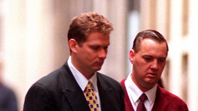 Leslie Camilleri (left) is led from court after his 1999 sentencing for the Bega schoolgirl murders.