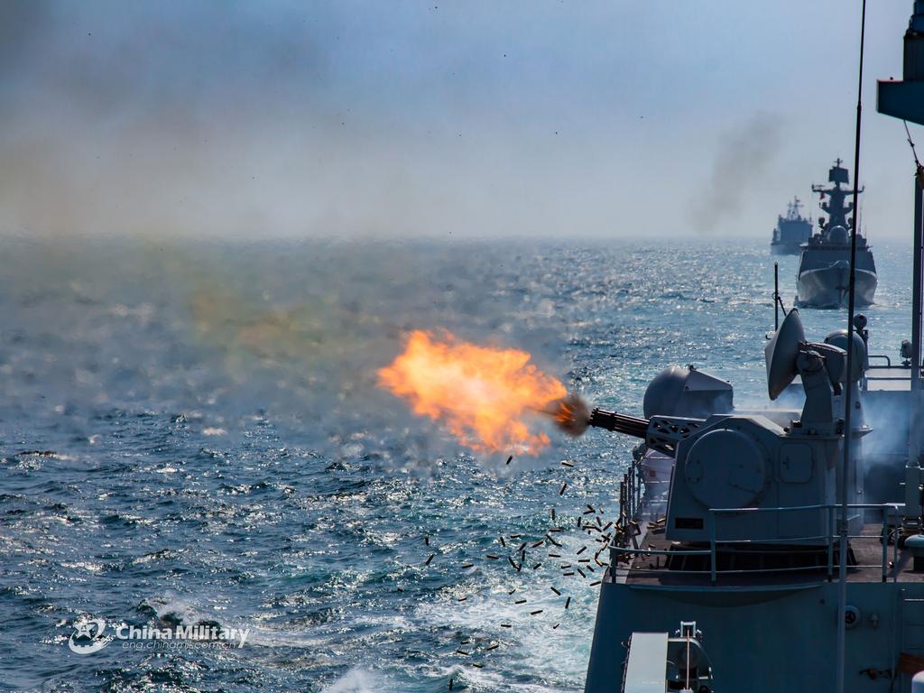 The guided missile destroyer Shenzhen (Hull 167) attached to a destroyer flotilla with the navy under the PLA Southern Theatre Command fires its close-in weapons system at mock sea targets.