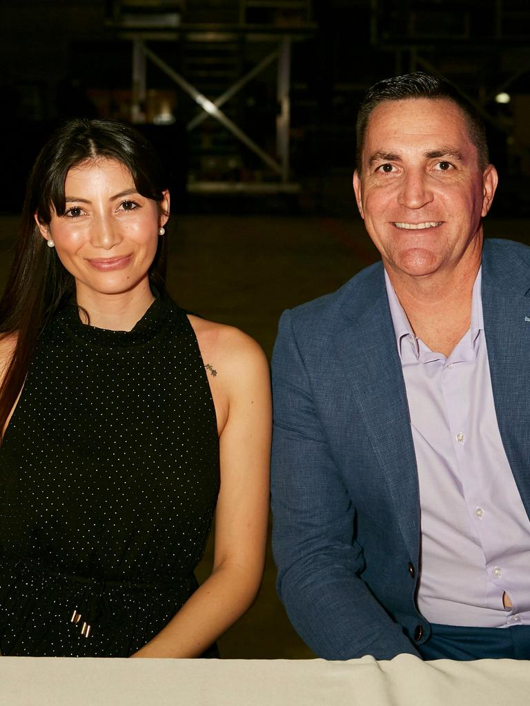 Tita Smith and Paul Woosnam at the launch of Virgin Australia's new business-class menu in the Virgin hangar at Brisbane Airport. Picture: Carly Ravenhall