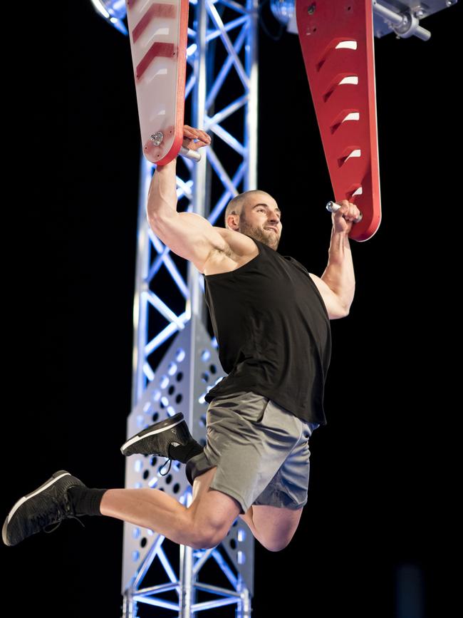 Max Pertzel competing on the extreme obstacle course.