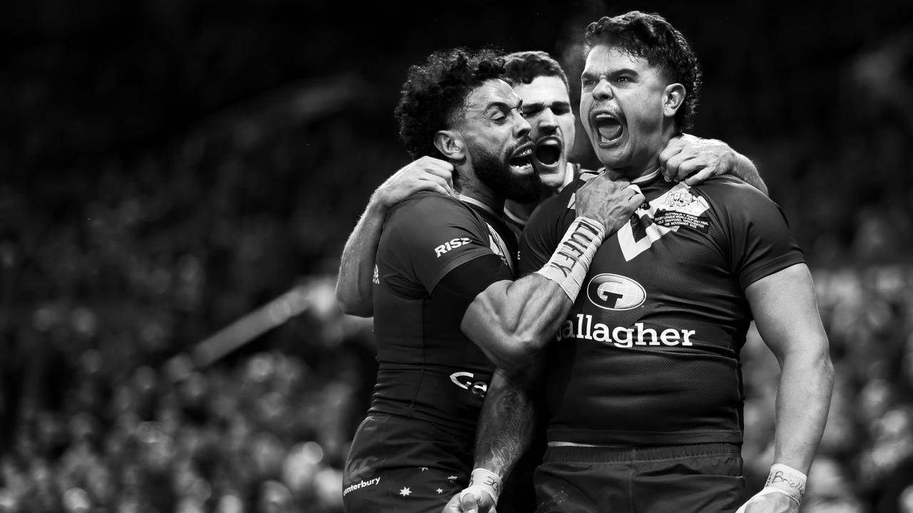 Latrell Mitchell of Australia celebrates their sides first try with Josh Addo-Carr