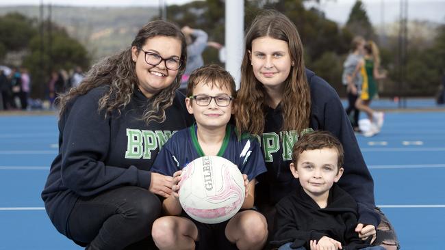 Renae Walker with her Children Tamryn, 15, Max, 9, and Oscar, 4 at the SA Districts Netball Courts in Golden Grove. Picture: Emma Brasier