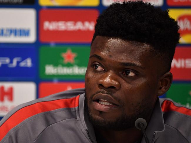 (FILES) In this file photo taken on March 10, 2020 Atletico Madrid's Ghanaian midfielder Thomas Partey attends a press conference at Anfield stadium in Liverpool, north west England. - Arsenal's move for Atletico Madrid midfielder Thomas Partey is expected to be the biggest deal of transfer deadline day, while Edinson Cavani is on the verge of a move to Manchester United. (Photo by Paul ELLIS / AFP)
