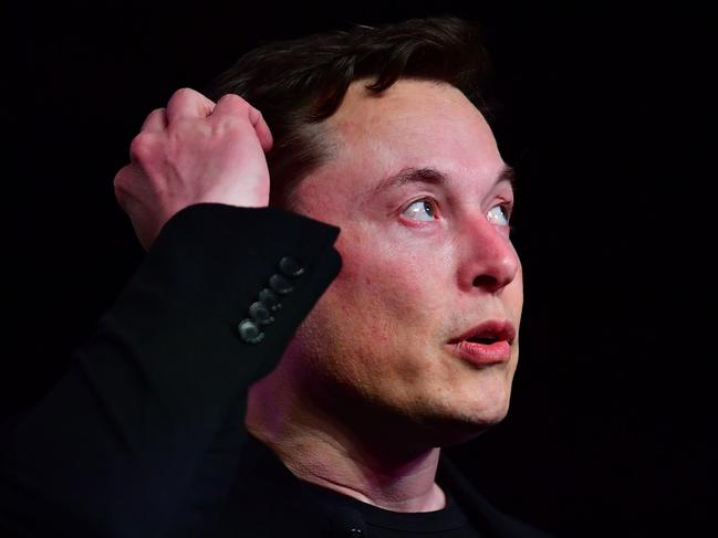 (FILES) In this file photo taken on March 14, 2019 Tesla CEO Elon Musk speaks during the unveiling of the new Tesla Model Y in Hawthorne, California. - Futurist entrepreneur Elon Musk late July 16, 2019, revealed his secretive Neuralink startup is making progress on an interface linking brains with computers, and said they hope to begin testing on people next year. (Photo by Frederic J. BROWN / AFP)