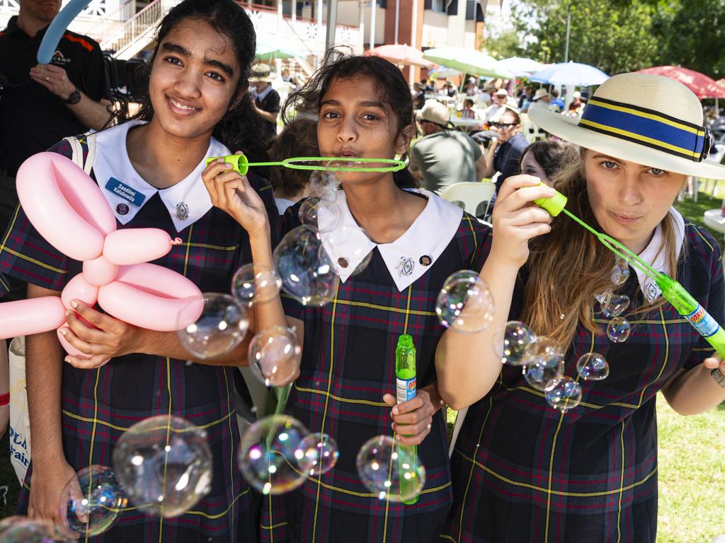 Having fun with bubbles are (from left) Sandilmi Kalubowila, Senudi Sesathpura and Monique Hitchcock at the Fairholme Spring Fair, Saturday, October 19, 2024. Picture: Kevin Farmer