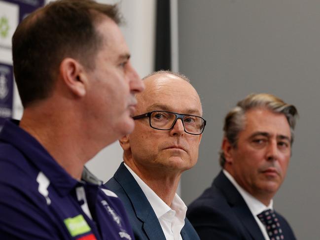 Ross Lyon, club president Dale Alcock, centre, and Steve Rosich, right. Picture: Paul Kane/Getty Images)