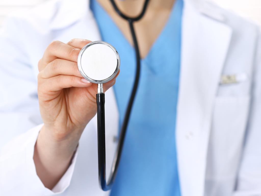 Doctor woman holds stethoscope head, close-up. Physician ready to examine and help patient. Helping and insurance in health care, best treatment and medicine concept.