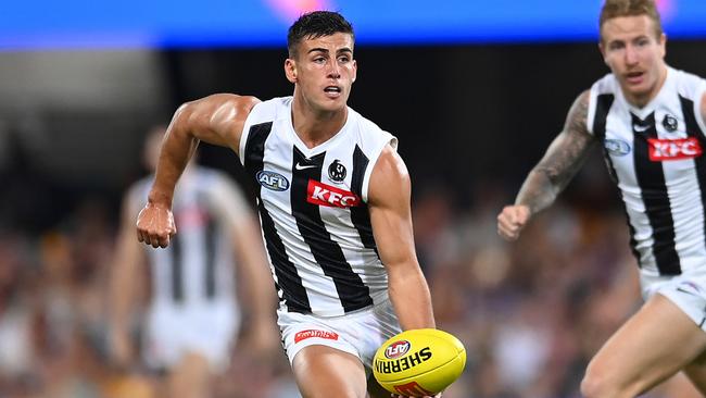 BRISBANE, AUSTRALIA - MARCH 28: Nick Daicos of the Magpies in action during the round three AFL match between Brisbane Lions and Collingwood Magpies at The Gabba, on March 28, 2024, in Brisbane, Australia. (Photo by Albert Perez/AFL Photos via Getty Images )