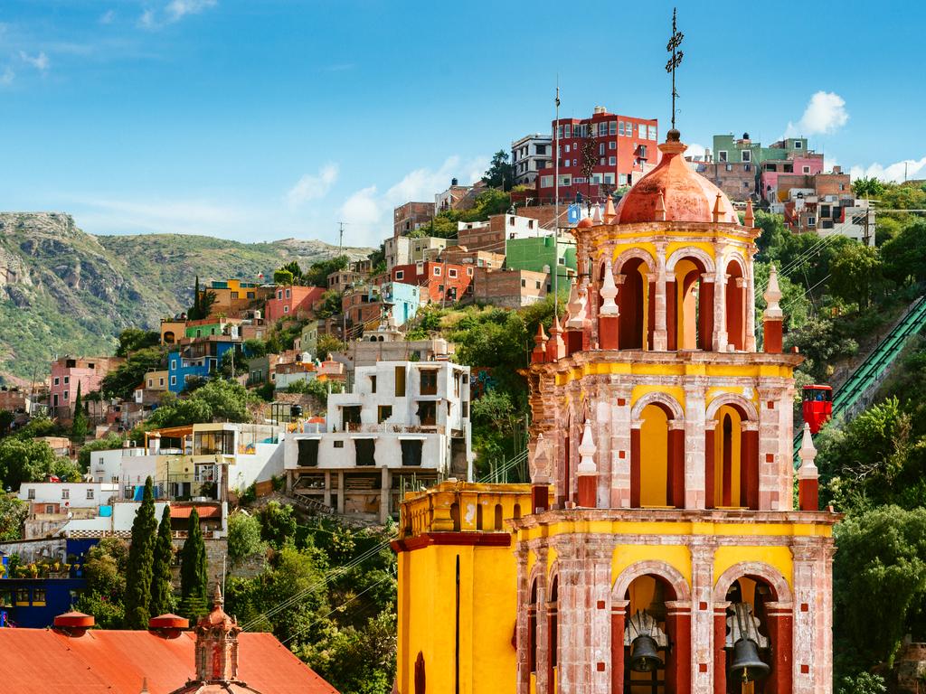 <p><b>GUANAJUATO, MEXICO</b> With buildings painted in every colour imaginable, bougainvillea around every corner and plenty of culture, Guanajuato, a colonial city in the mountains of central Mexico, is the place to go. If you&rsquo;re travelling with a significant other, be sure to get a photo at Callejon del Beso, (the Alley of the Kiss) where it&rsquo;s believed that a couple must kiss on the third step in order for their love to last forever.<b><br></b>PRO TIP: If you&rsquo;re interested in delicious street food, be sure to <a href="http://www.mexicostreetfood.com/" target="_blank" rel="noopener">book a food tour</a>.</p>