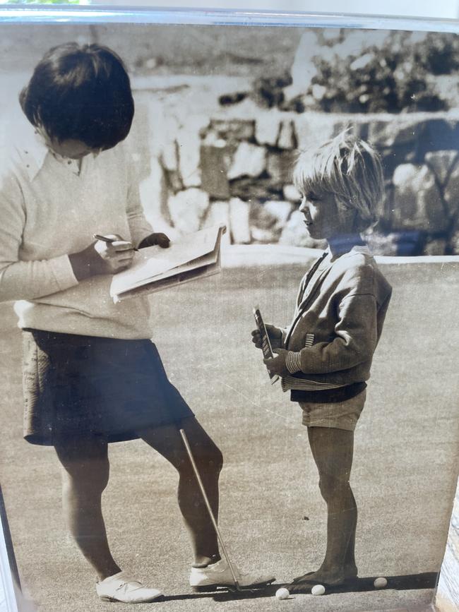 Andrew Westacott aged 9 gets an autograph from golfer, Chako Higuchi in 1974. Picture: Supplied