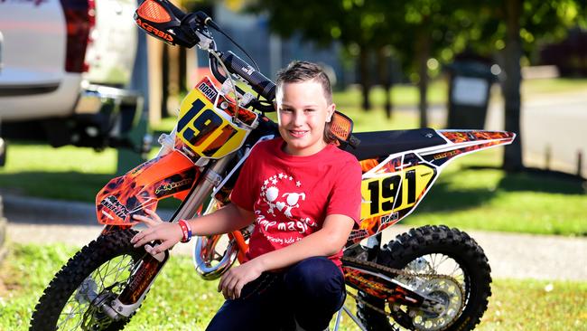 Noah Schulte 10, speaks about attending Camp Magic, to help him deal with trauma. Picture: Alix Sweeney