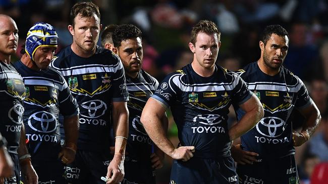 The players’ faces say it all. (Ian Hitchcock/Getty Images)