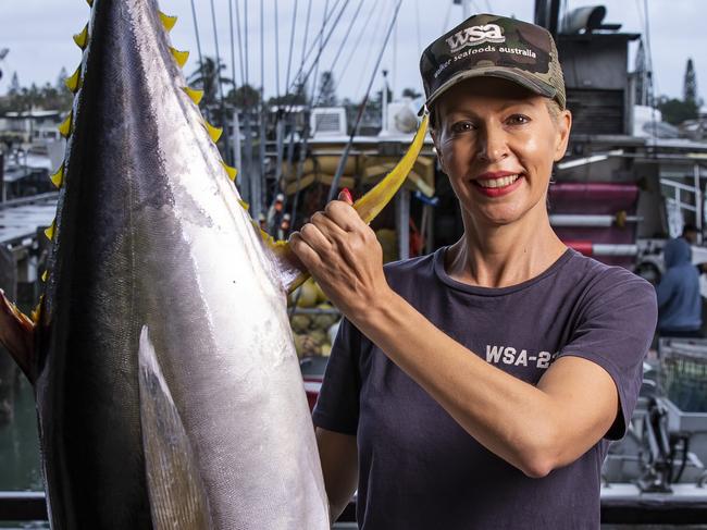 QBM - Walker Seafoods Australia at Mooloolaba - Heidi Walker (with a yellowfin tuna) for our exporter series. Heidi is the co-owner and managing director of Walkers, which has seen an 80 per cent loss in business following the COVID-19 pandemic. Pic Mark Cranitch.