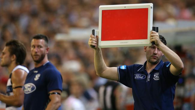 Geelong officials opted for colours to get messages to players. Pic: Michael Klein.