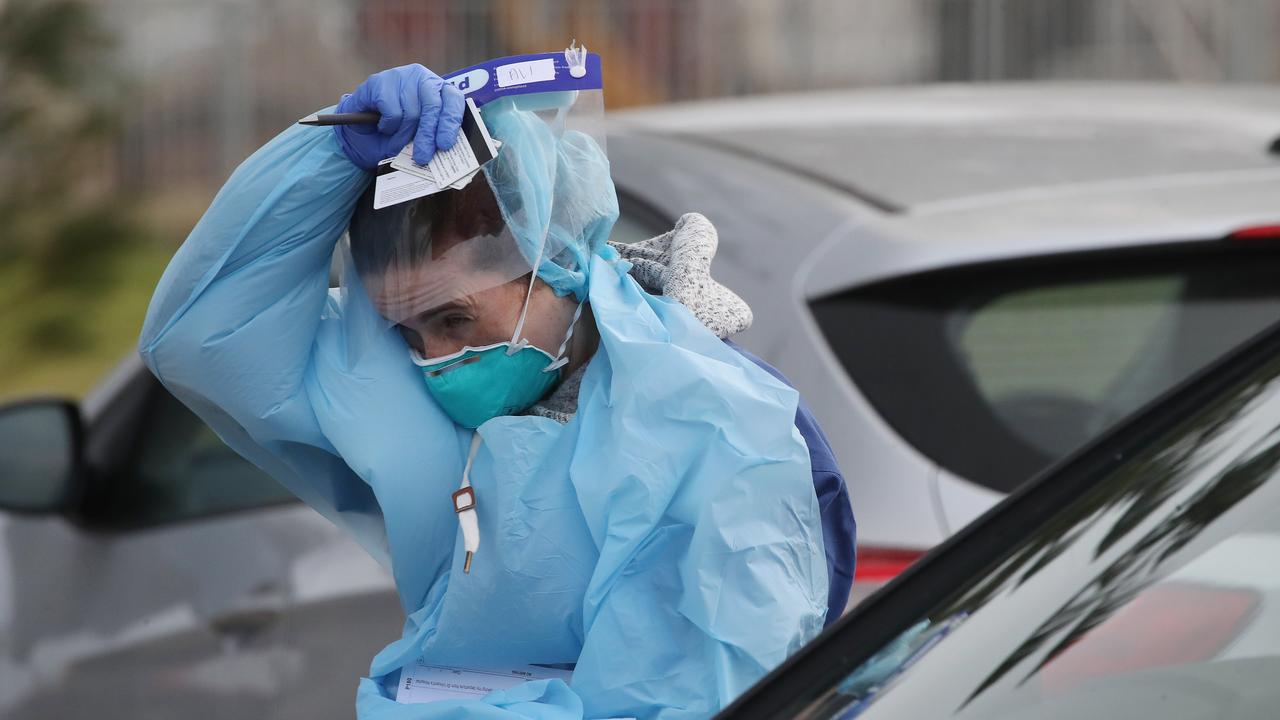 Nurses working on the frontline, like at this testing clinic in Bondi Beach, must wear PPE for hours on end. Picture: David Swift/NCA NewsWire