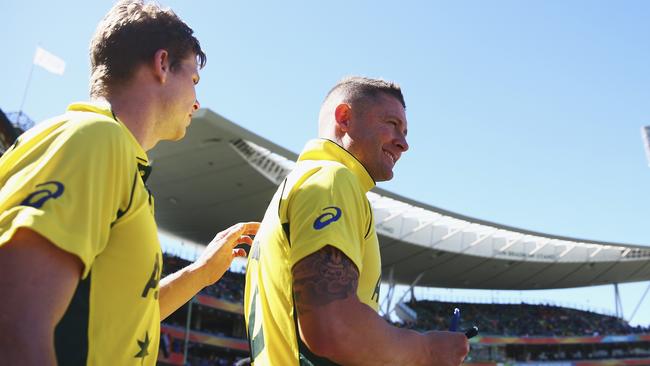 SYDNEY, AUSTRALIA - MARCH 26: Michael Clarke and Steve Smith of Australia walk out for the national anthem during the 2015 Cricket World Cup Semi Final match between Australia and India at Sydney Cricket Ground on March 26, 2015 in Sydney, Australia. (Photo by Ryan Pierse/Getty Images)