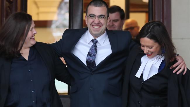 Convicted gangland figure Faruk Orman walks from the Supreme Court after being acquitted. Ruth Parker, Farouk Orman and Carly Marcs Lloyd. Picture: Alex Coppel