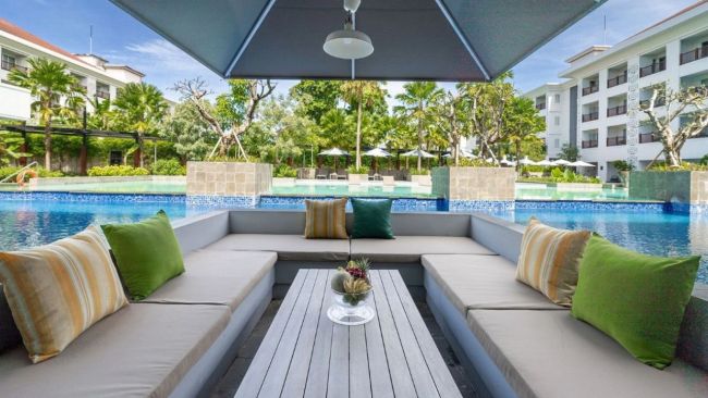 Enjoy free cocktails by one of three spectacular pools at the Grand Mecure Bali Seminyak. Picture: Luxury Escapes