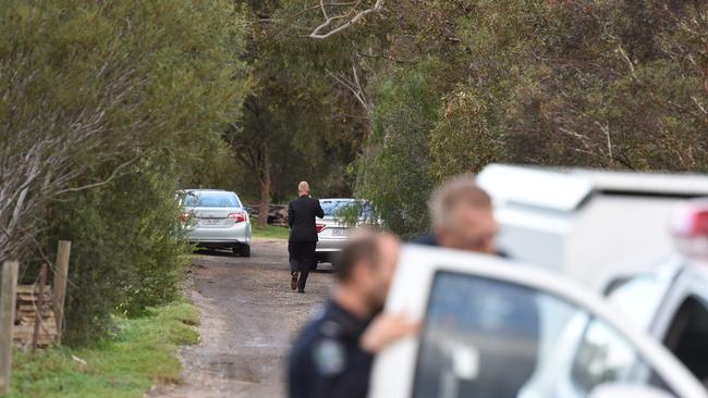 Police at the property in Hillier where the bodies of a woman and two children have been found. Picture: Sam Wundke