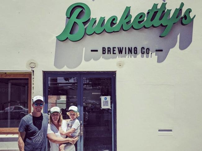 Nick and Alexi McDonald, founders of Bucketty's Brewing Co, which is opening in Orchard Rd, Brookvale in February 2021. Pictured with son Asher, 3. Picture: Instagram @buckettys.