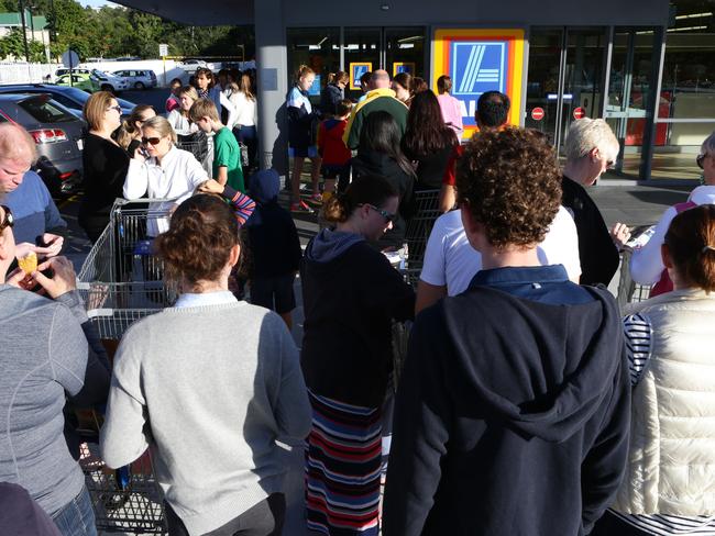 People queue up for Aldi's annual snow gear sale in Queensland in 2016. Picture: Darren England