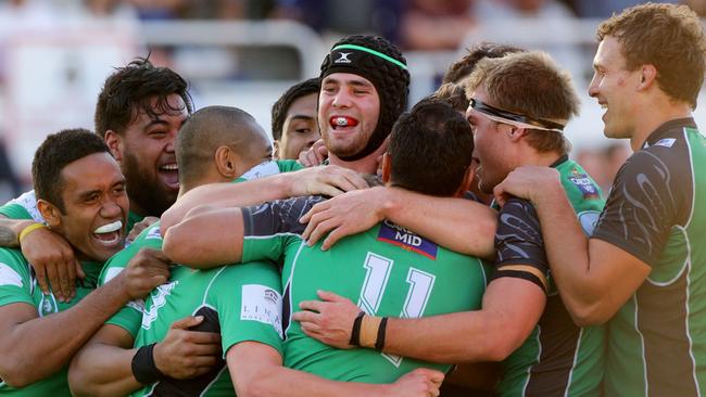 Jake McIntyre of Sunnybank celebrates scoring the winning try with team mates during the Brisbane Club Rugby Union Preliminary Final played between GPS and Sunnybank. Pic Darren England.