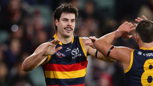 ADELAIDE, AUSTRALIA - JUNE 29: Darcy Fogarty of the Crows celebrates a goal with Josh Rachele during the 2024 AFL Round 16 match between the Adelaide Crows and the GWS GIANTS at Adelaide Oval on June 29, 2024 in Adelaide, Australia. (Photo by Sarah Reed/AFL Photos via Getty Images)