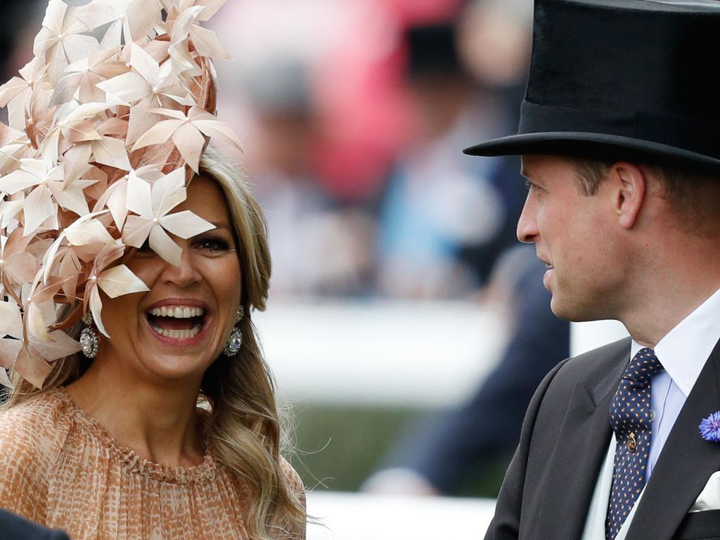 Prince William talks with Dutch Queen Maxima at the famous Berkshire course. Picture: Adrian Dennis / AFP