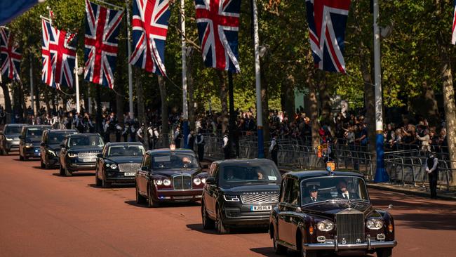 King Charles III and Camilla, Queen Consort are driven along the Mall after the procession. Picture: Getty Images.