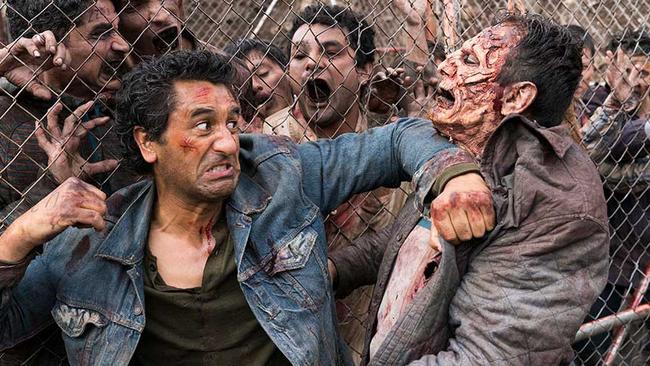 Travis is gone, but not before he took down a pit full of Walkers in a way that would have warmed Rick Grimes’ heart.