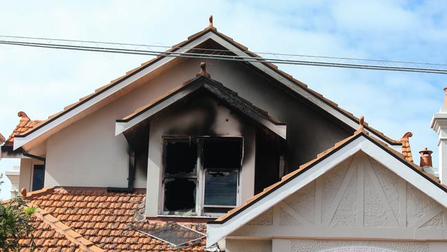 Smoke has billowed out across Manly after the top level of a newly renovated home on Sydney Road was engulfed in flame. Picture: NCA Newswire/ Gaye Gerard