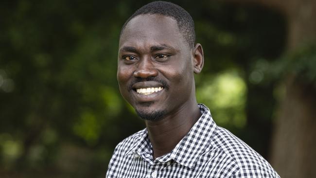 Thuch Angui prepares to celebrate Australia Day 2022, Monday, January 24, 2022. Picture: Kevin Farmer