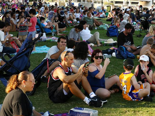 Crowds building at South Bank at 4:45pm hours ahead of the fireworks display, New Year's Eve socials South Bank, South Brisbane.