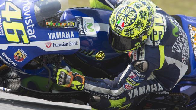 KUALA LUMPUR, MALAYSIA - FEBRUARY 23: Valentino Rossi of Italy and Movistar Yamaha MotoGP rounds the bend during the MotoGP Tests in Sepang - Day One at Sepang Circuit on February 23, 2015 in Kuala Lumpur, Malaysia. (Photo by Mirco Lazzari gp/Getty Images)