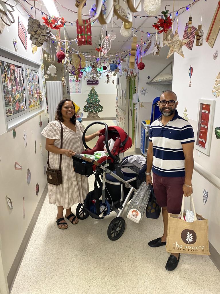 Neha Goel and Ben Aggarwal leave Mater Mothers‘ Hospital with their twins Aaliya and Aashay. Picture: Supplied .