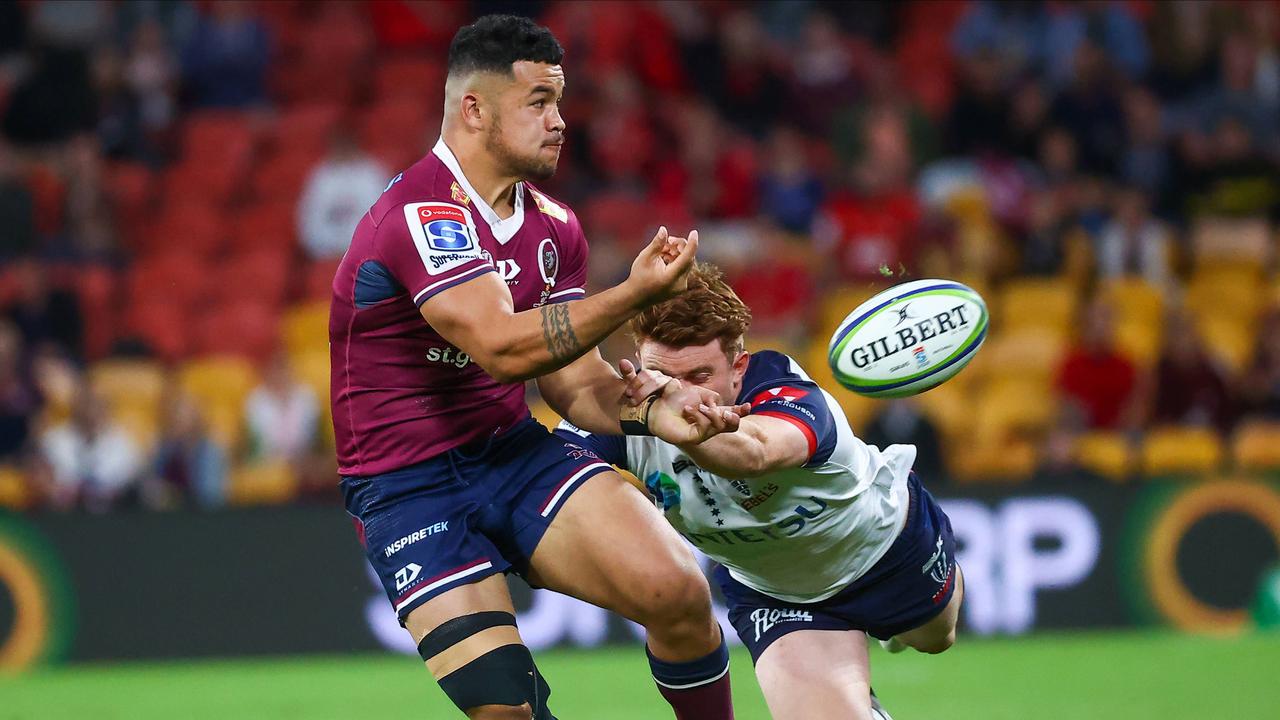 Reds centre Hunter Paisami unloads the ball in Queensland’s Super Rugby AU semi-final win over the Rebels. Picture: Patrick Hamilton