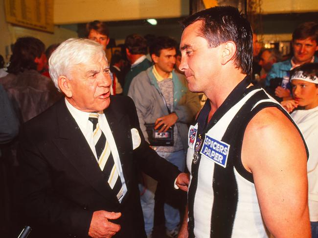 Lou Richards and Pies captain Tony Shaw after the team won the 1990 Grand Final.