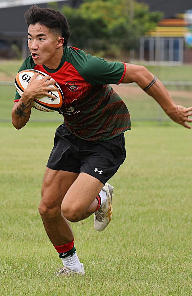 Shunsei Okazaki making a run for South Darwin's B-grade side. From The Sideline Sports Photography