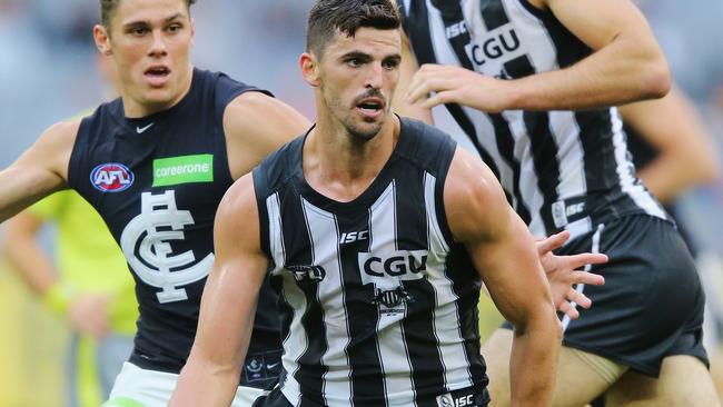 Collingwood’s commemorative 125-year anniversary guernseys this year featured black pinstripes. Picture: Getty